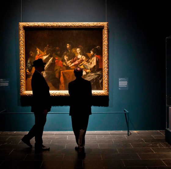people near a picture
